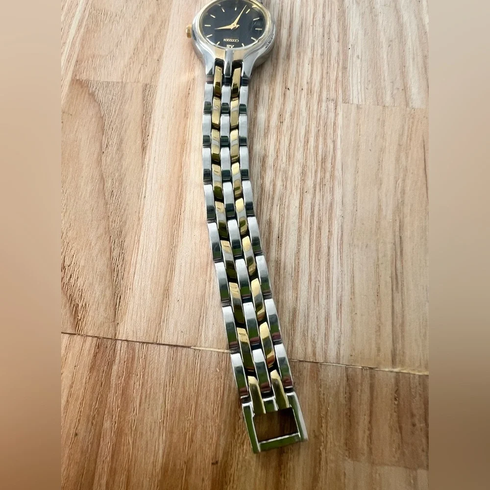 Citizen eco-drive ladies black dial two toned solar dress watch